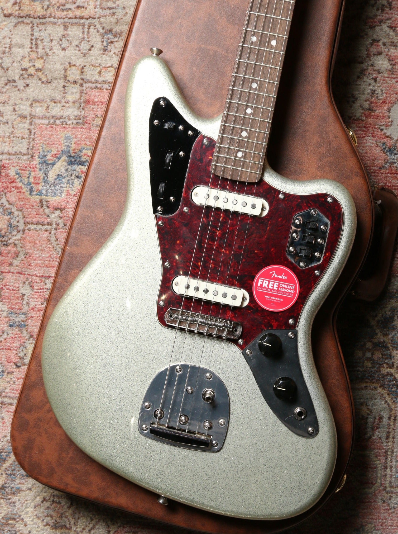 Squier by Fender   FSR Classic Vibe 60s Jaguar Laurel Fingerboard Tortoiseshell Pickguard Matching Headstock Silver Sparkle